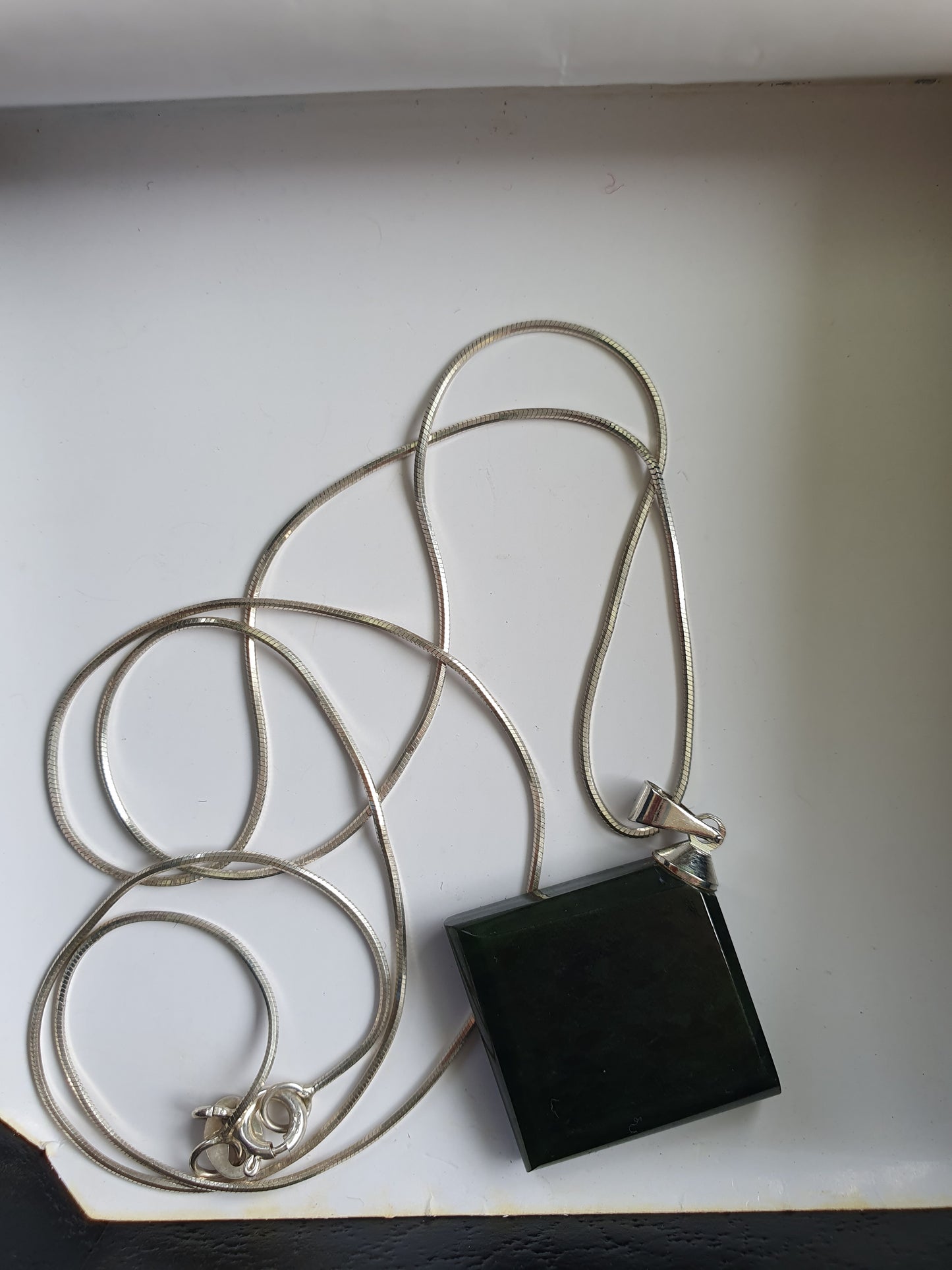 Nephrite Stone Pendant with Silver Band – Handcrafted Jewelry from Gilgit Baltistan