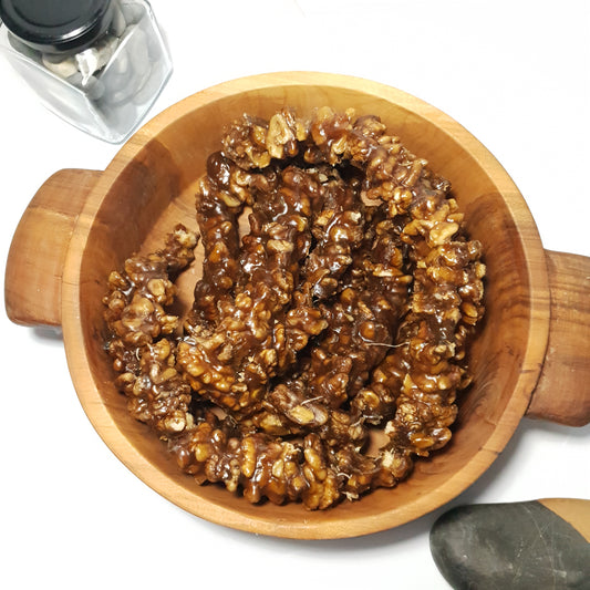 A wooden bowl full of "Kilao" a local delicacy from gilgit